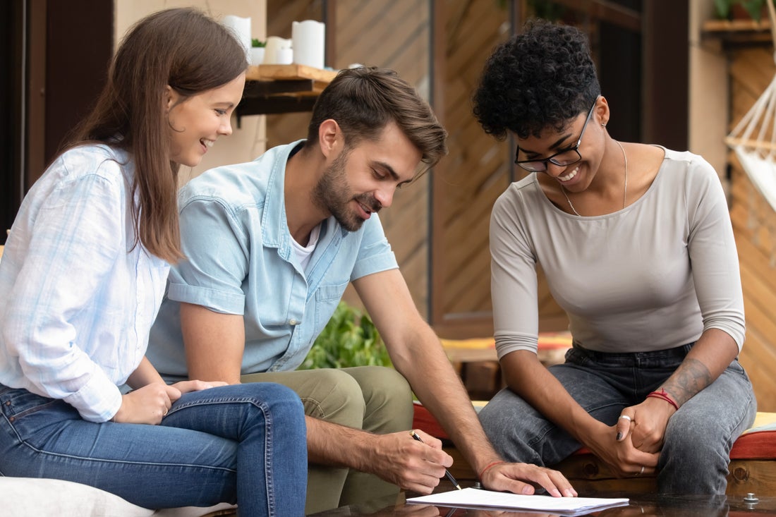 a group of people sitting at a table